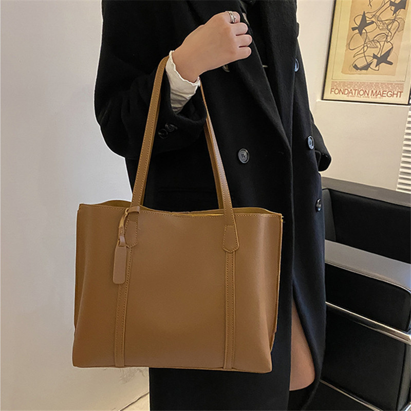 Classic Black Faux Leather Tot - đánh giá và giá Leather Work Handbag